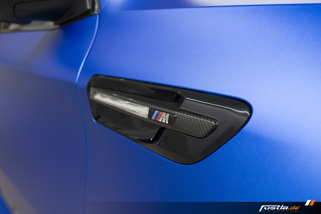 BMW X6M E71 Car-Wrapping Vollfolierung KPMF Blau Carbon 5.jpg