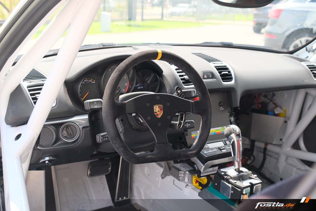 Porsche GT4 Clubsport 981 Teilfolierung Motorsport Rennsport Streifen Stripes Schwarz Grau Grün Design (18).jpg